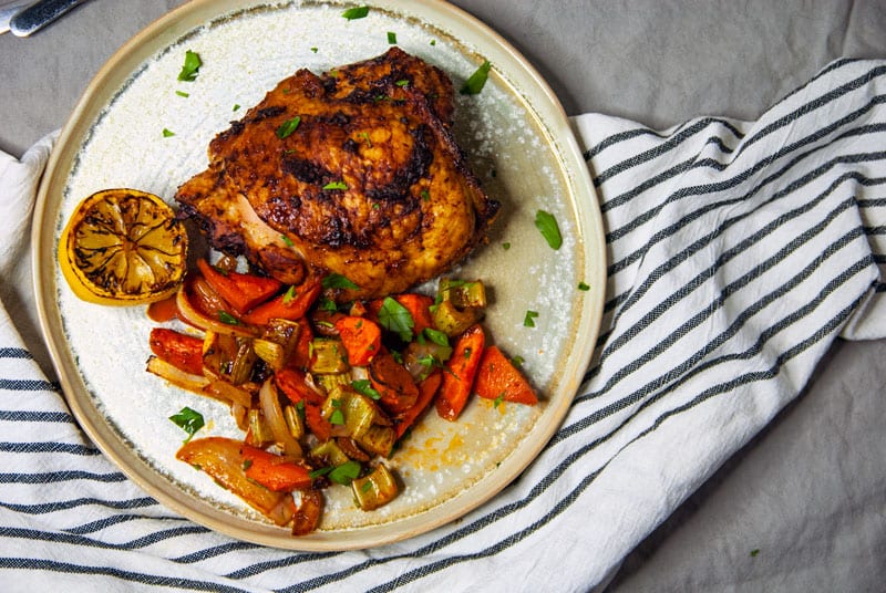 Harissa Chicken Thighs with Roasted Veggies- The Seasonal Junkie