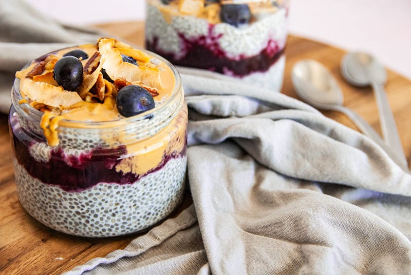 2 Glass Jars filled with chia pudding and compote