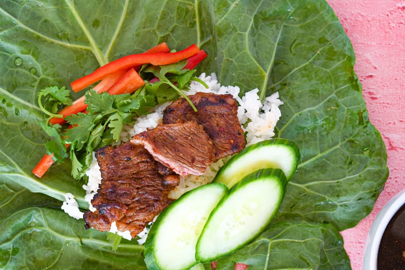 Korean Beef Collard Green Wraps showing the ingredients inside the wrap