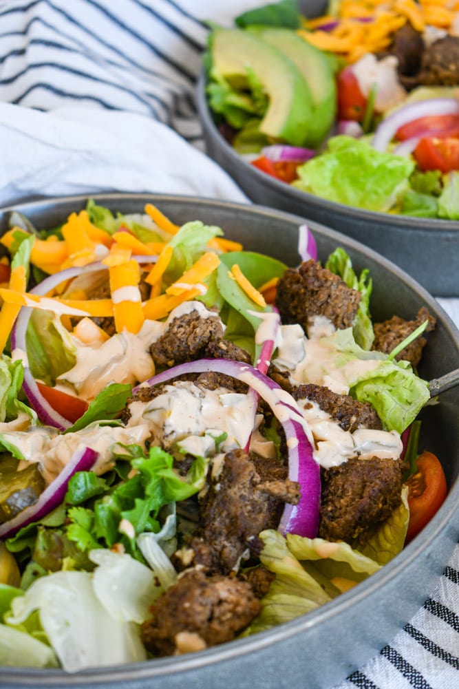 Side view of Cheeseburger Salad with Thousand Island Sauce