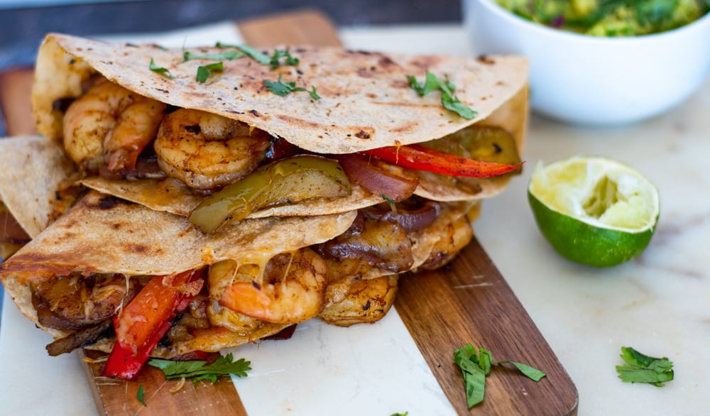 Stacked quesadillas with shrimps showing