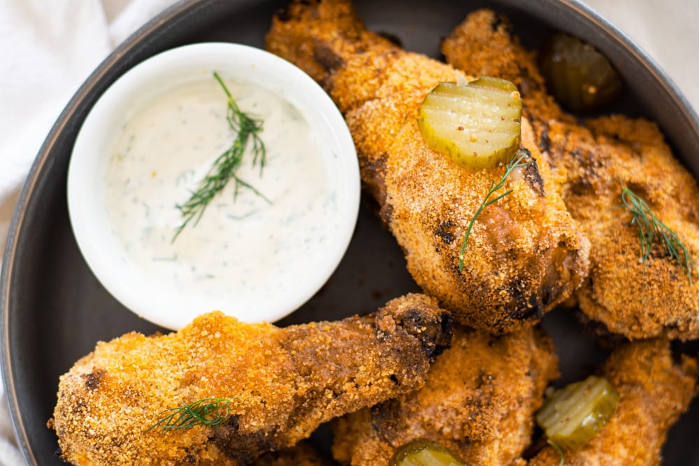 Overhead shot of Airfried Pickle Chicken Drumsticks with dill dip