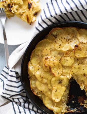 Dairy Free Scalloped potatoes with a slice cut out of it