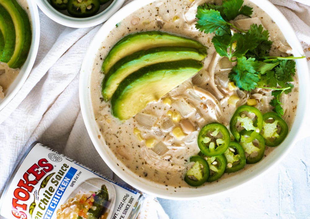 Over had shot of Creamy White Chicken Chili with Stokes Green Chili Sauce